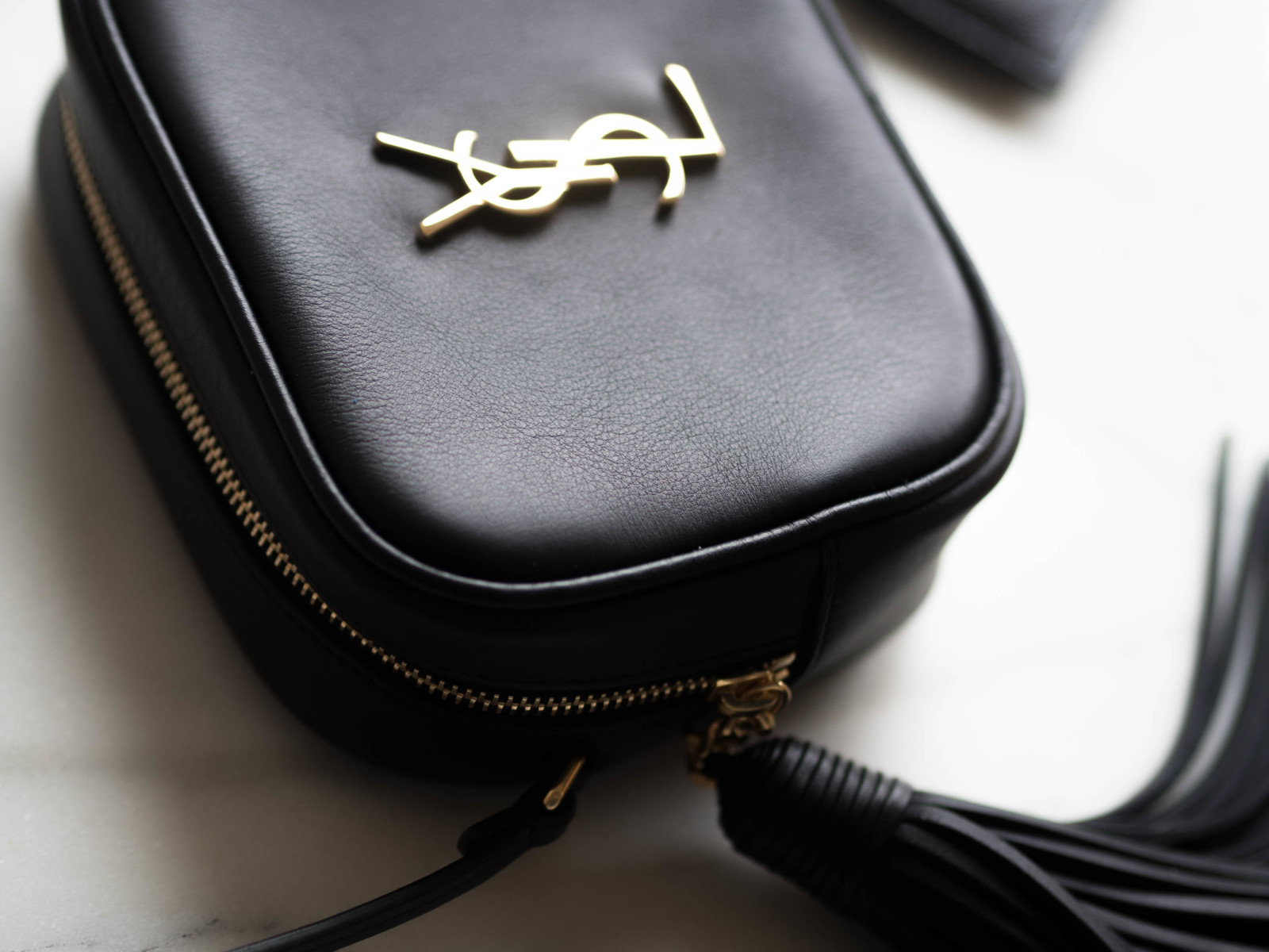 HOW TO STYLE: THE YSL BLOGGER BAG 5 WAYS 